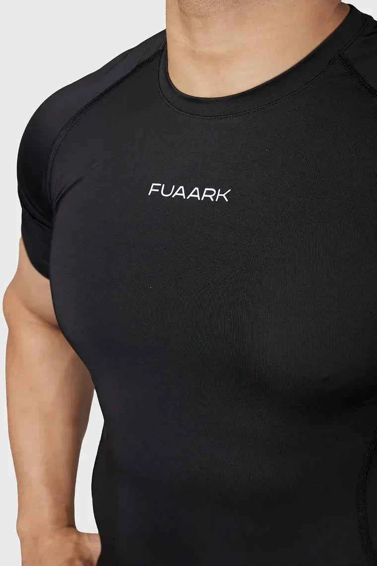 Black compression T-shirt by Fuaark Nz, designed for ultimate performance and comfort, shown on a plain background.