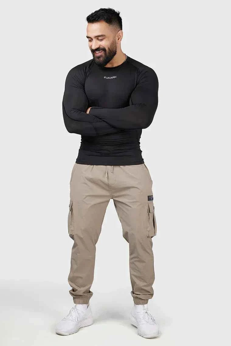 Black compression full sleeve T-shirt by Fuaark Nz, designed for athletic performance and comfortable fit.