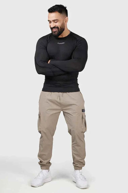 Black compression full sleeve T-shirt by Fuaark Nz, designed for athletic performance and comfortable fit.