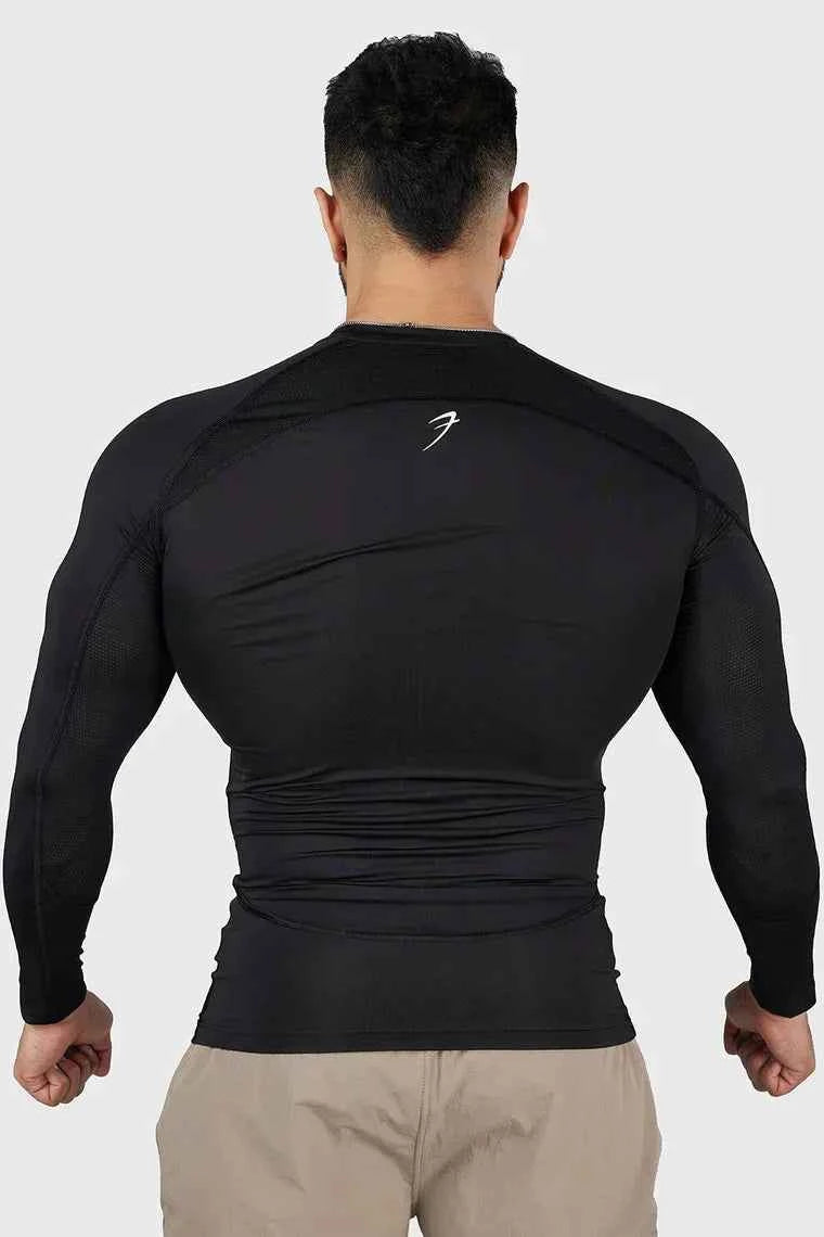Black compression full sleeve T-shirt by Fuaark Nz designed for athletes and active wear, showcasing a sleek, fitted look.