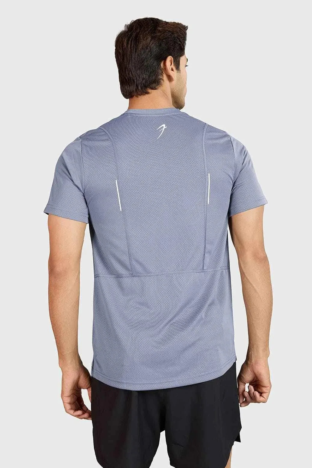 Grey Fuaark Nz slate performance running T-shirt for men, designed for comfort and athletic activity.