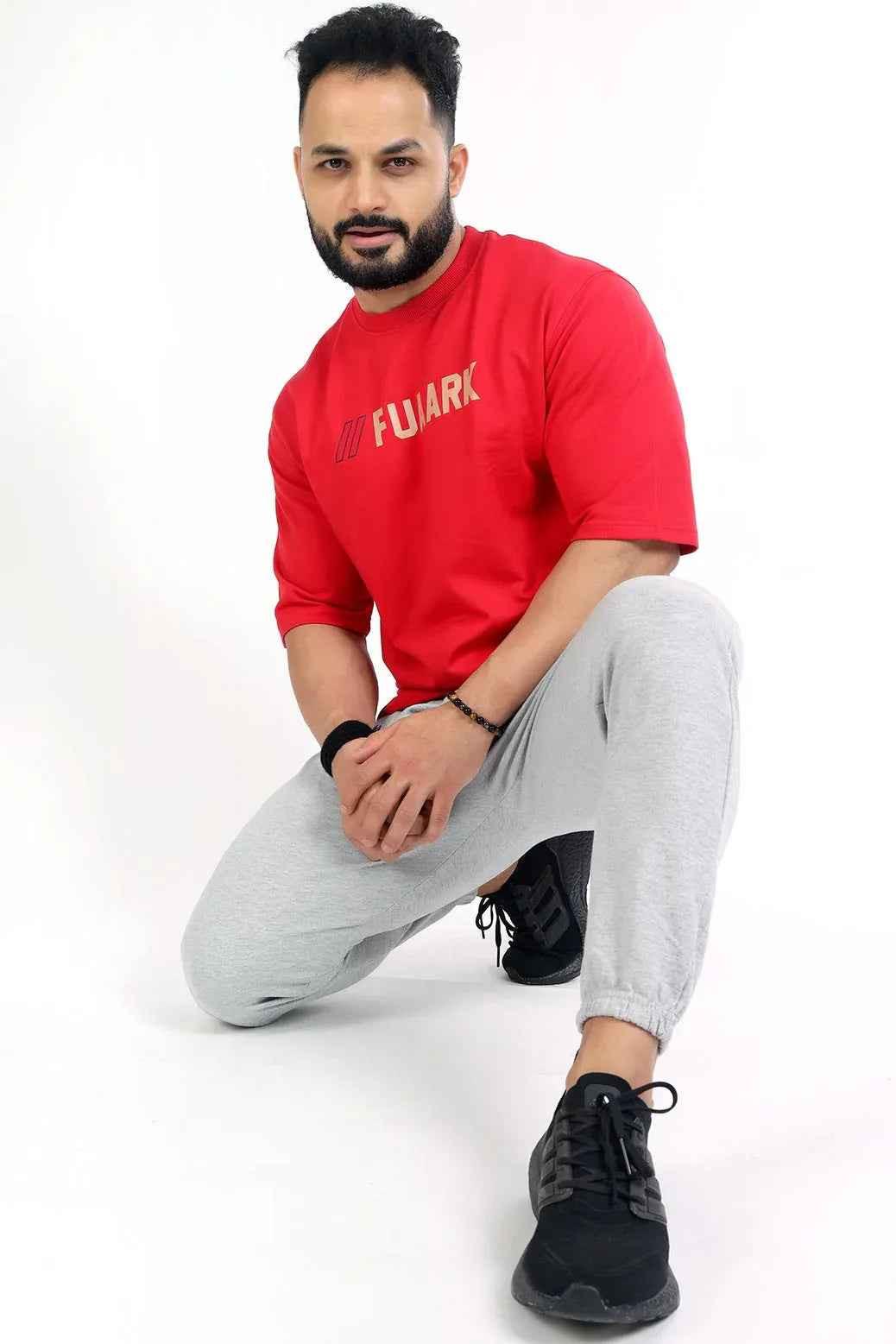 Fuaark Nz oversized red T-shirt for men, relaxed fit with soft fabric, perfect for casual wear and everyday comfort.