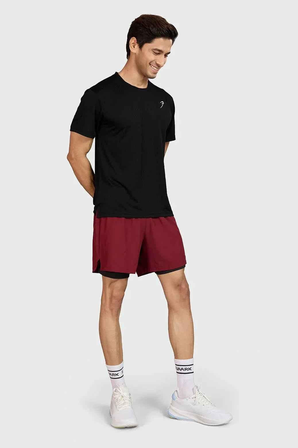 Black Motion Running T-shirt by Fuaark Nz, made of lightweight fabric with a sleek design and breathable fit.