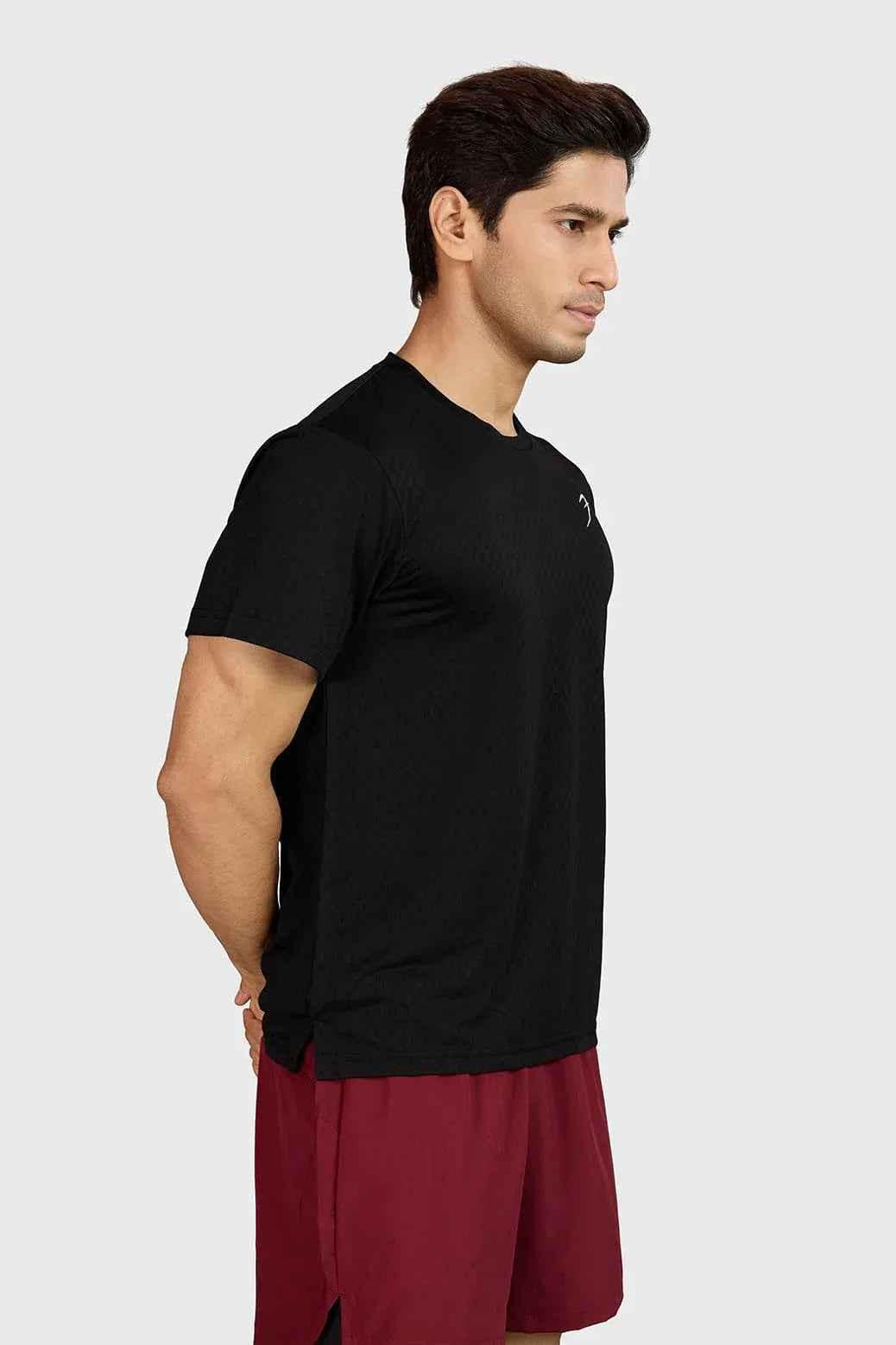 Black Motion Running T-shirt by Fuaark Nz, showcasing a sleek athletic design and lightweight fabric for active wear.