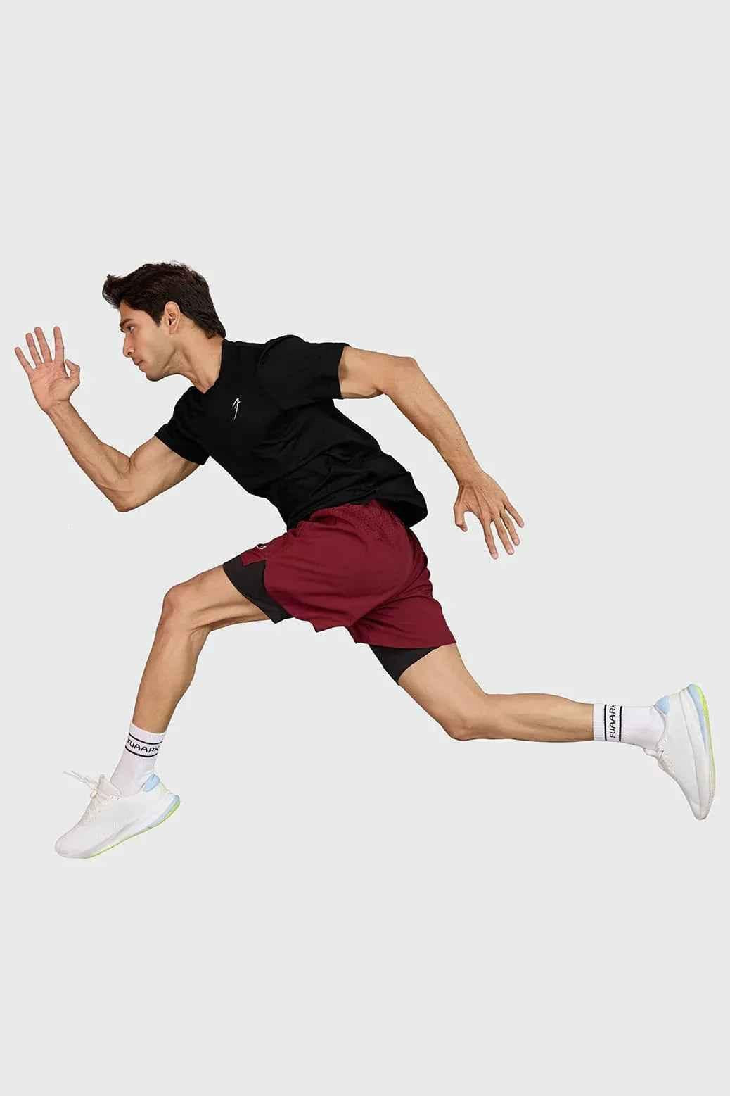 Black Motion Running T-shirt by Fuaark Nz, lightweight sports T-shirt with logo, designed for activewear and running.