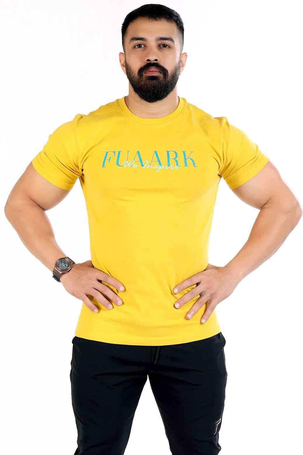 Mustard classic T-shirt for everyday comfort by Fuaark Nz, soft cotton fabric, casual fit, displayed on a hanger.