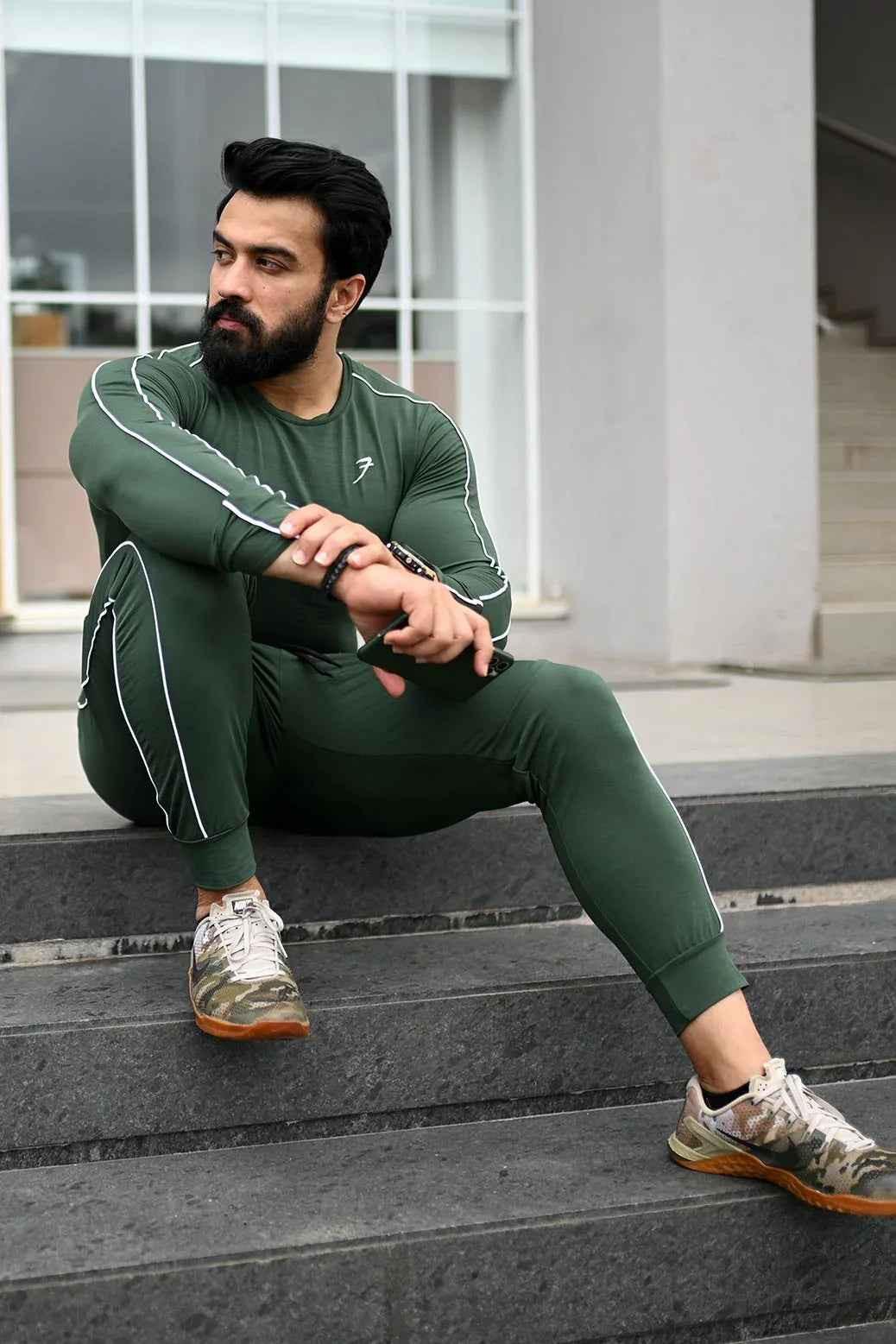 Green Revival Piping Fullsleeves T-shirt by Fuaark Nz, featuring piping details and a casual fit.