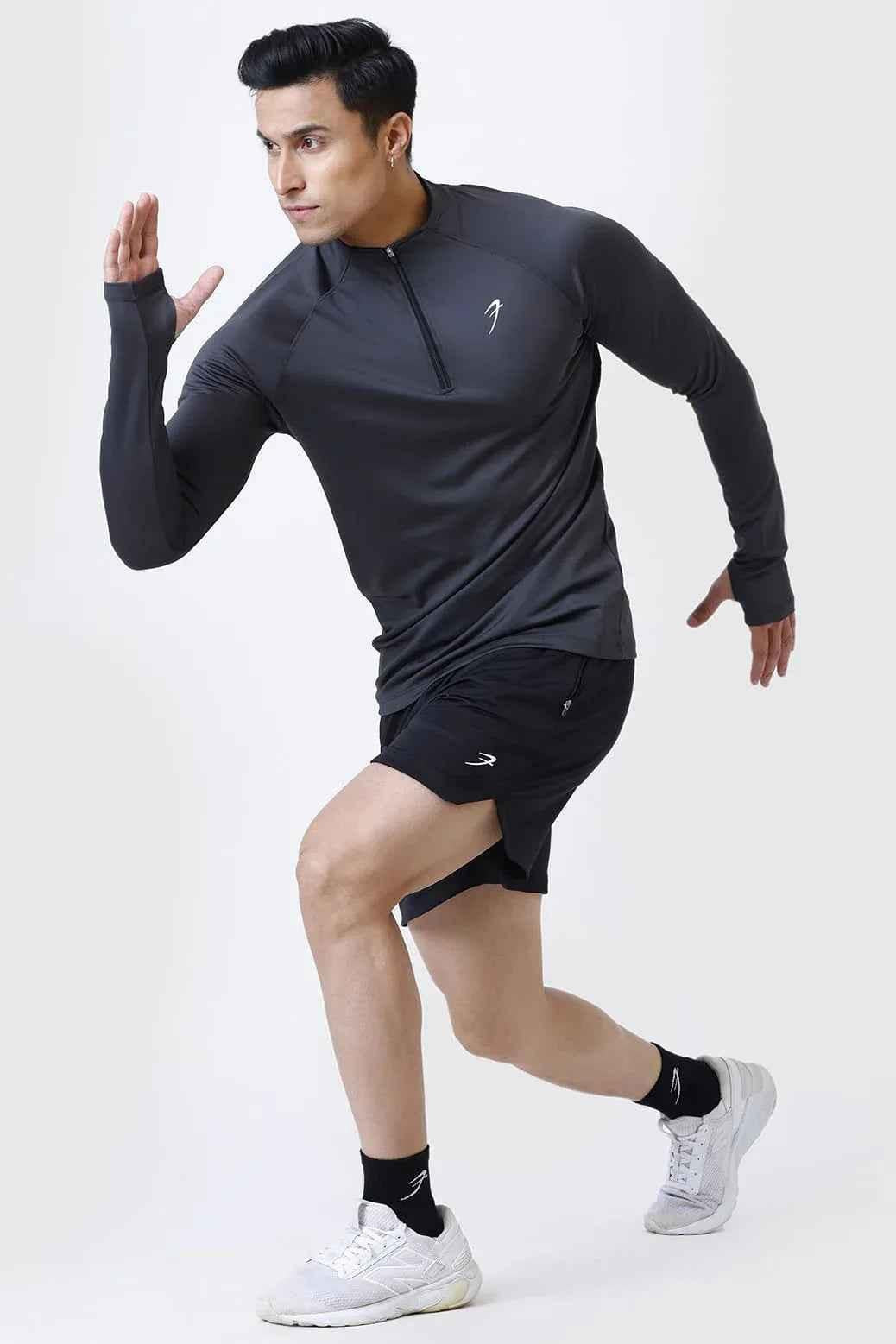 Dark grey Rush Pullover T-shirt by Fuaark Nz, casual fit, soft fabric, displayed on a plain background.