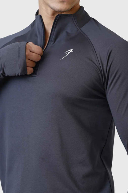 Dark grey Rush Pullover T-shirt by Fuaark Nz, featuring a casual fit and soft fabric, displayed on a plain background.