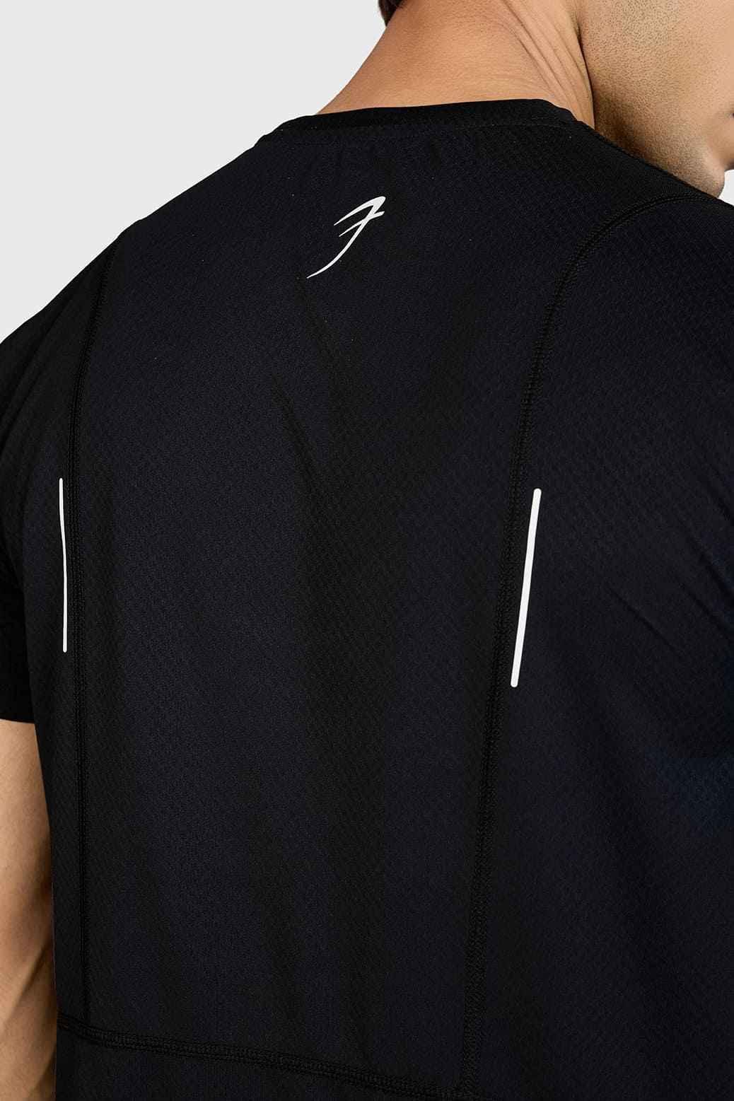 Black Slate Running T-shirt by Fuaark Nz, showcasing a comfortable fit and minimalist design for active wear.