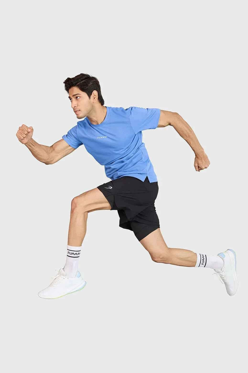 Blue Slate Running T-shirt by Fuaark Nz, featuring a comfortable fit and sporty design, shown on a model.