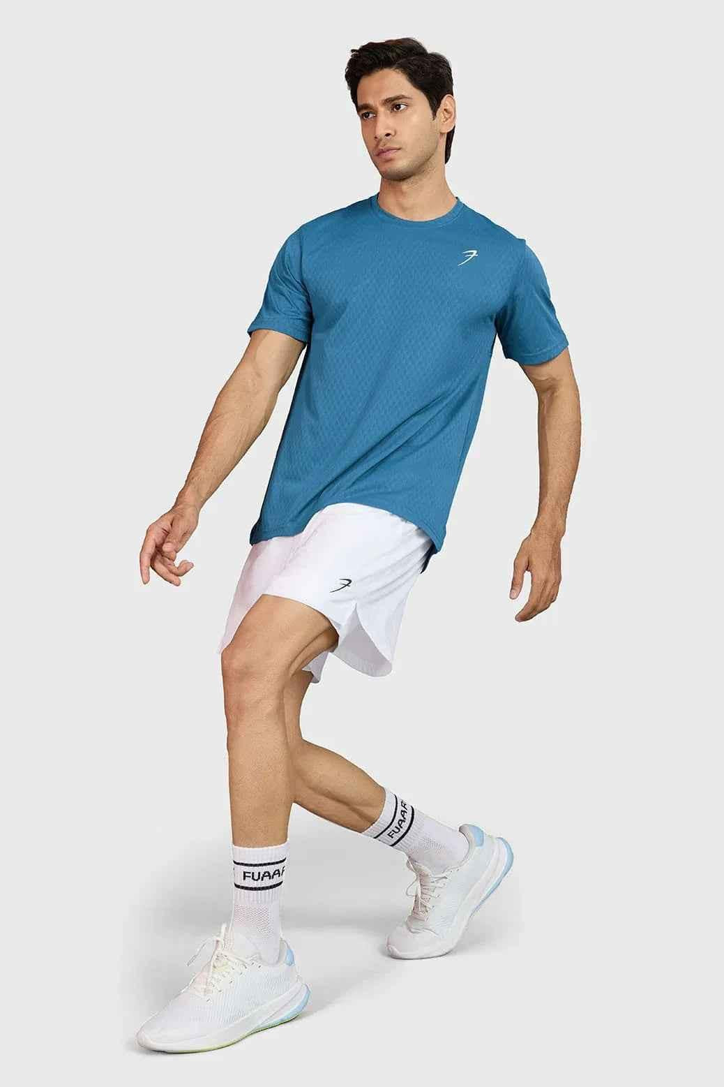 Teal Fuaark Nz motion running T-shirt made of lightweight, breathable fabric for comfortable active wear.