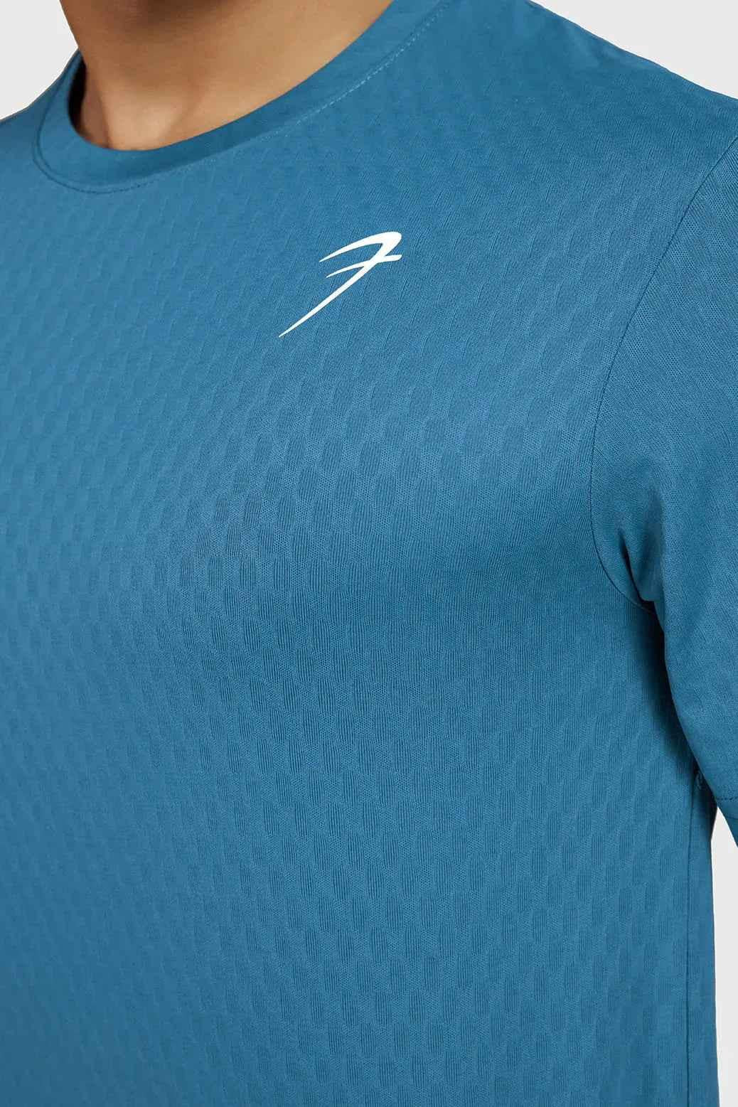 Teal Fuaark NZ Motion Running T-Shirt, lightweight breathable performance gear designed for comfort and active wear.