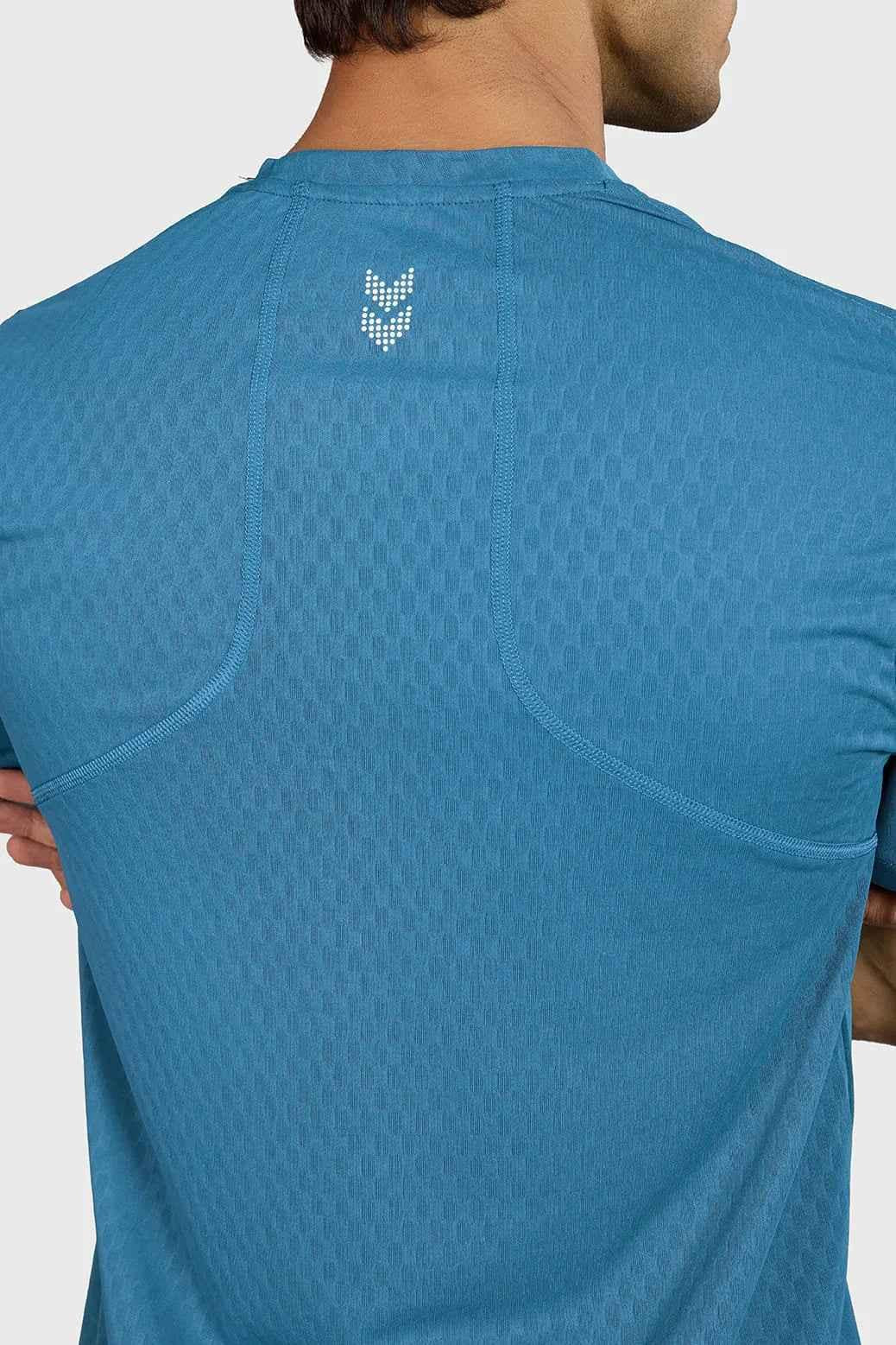 Teal Fuaark Nz Motion Running T-Shirt made of lightweight, breathable fabric for comfort during exercise.
