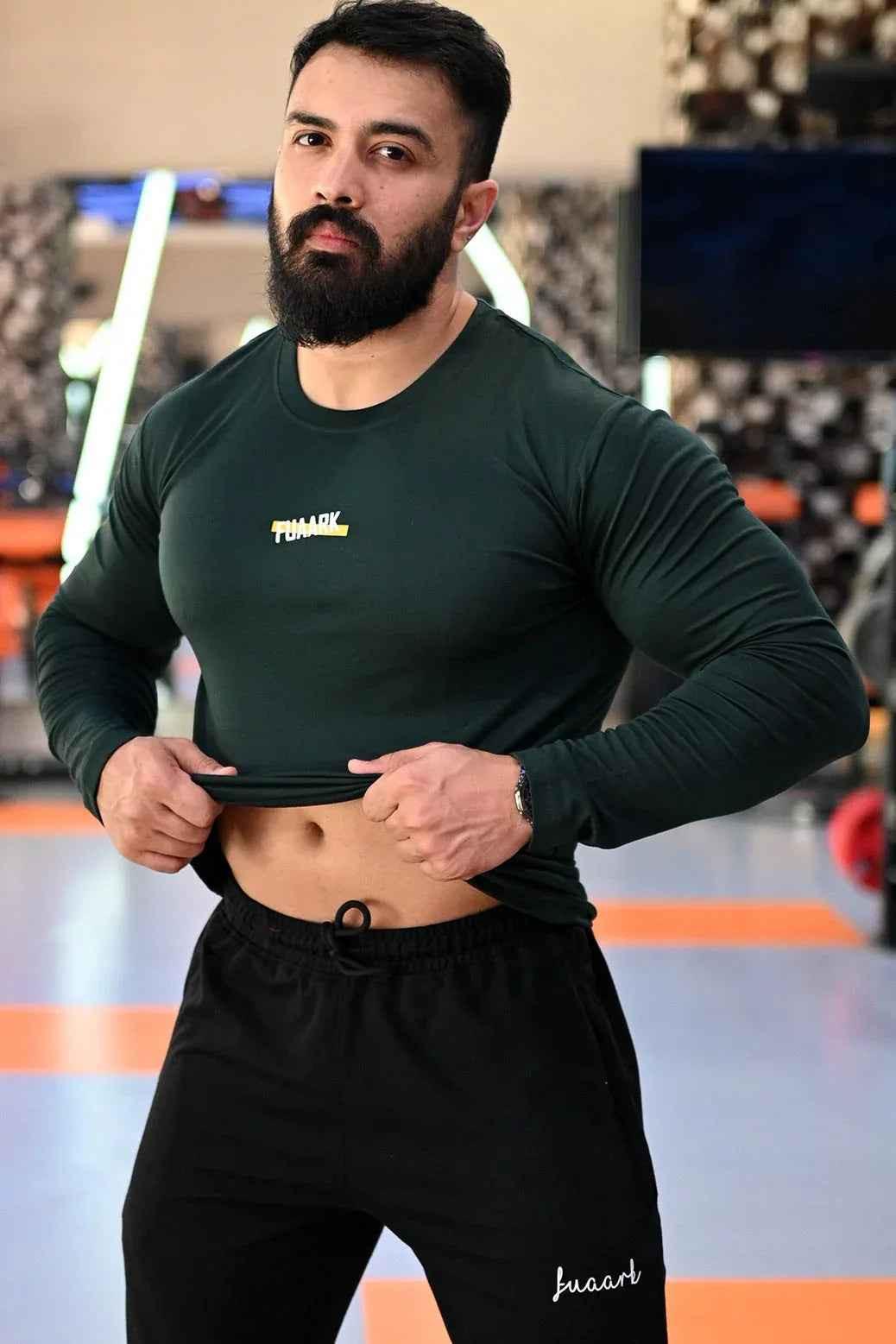 Green full sleeves T-shirt by Fuaark Nz, made of soft fabric, ideal for casual wear and stylish comfort.