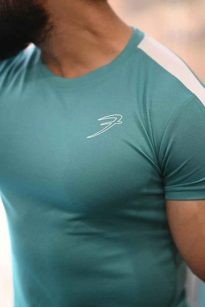 Vintage mint T-shirt by Fuaark Nz featuring retro style and classic design, displayed on a plain background.