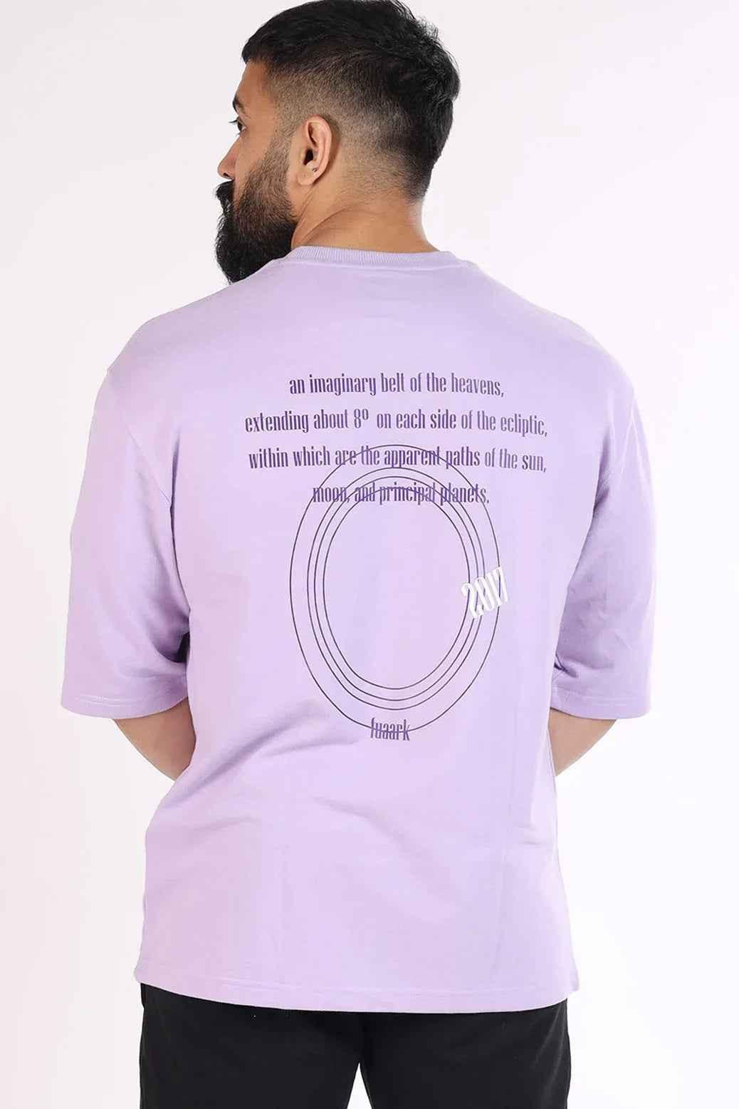 Lilac oversized Zodiac T-shirt by Fuaark Nz, featuring celestial-inspired design and comfortable fit on model.
