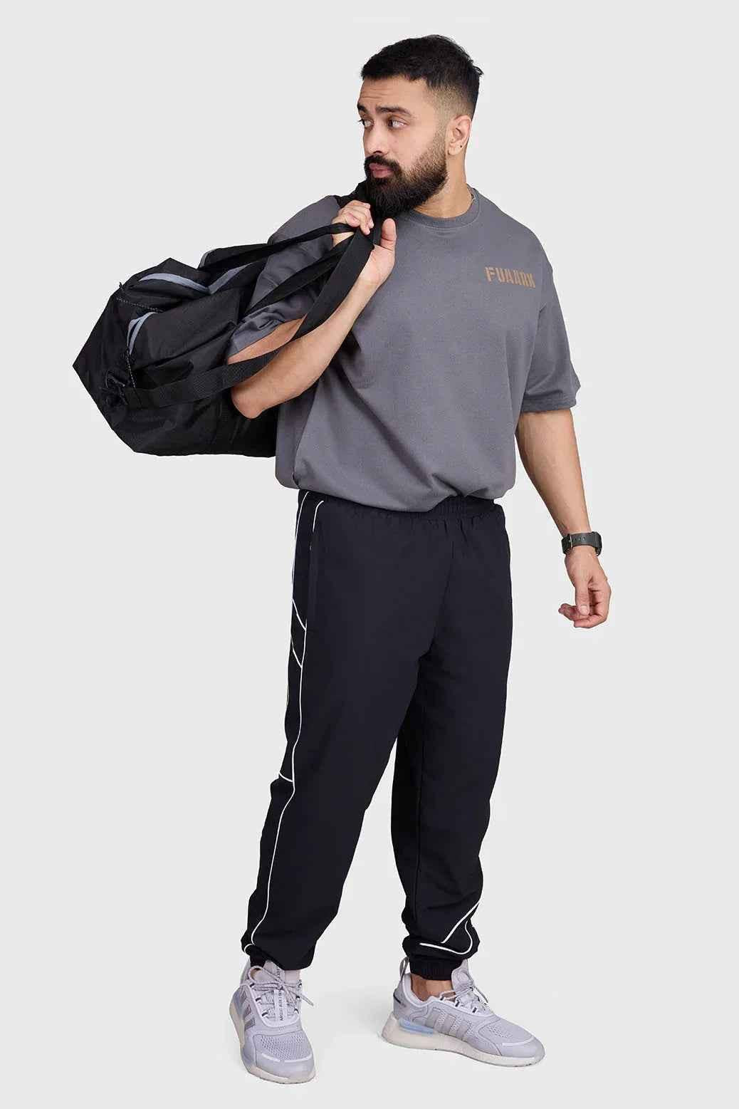 Charcoal Rage oversized T-shirt by Fuaark Nz, featuring a relaxed fit and soft fabric for effortless comfort.