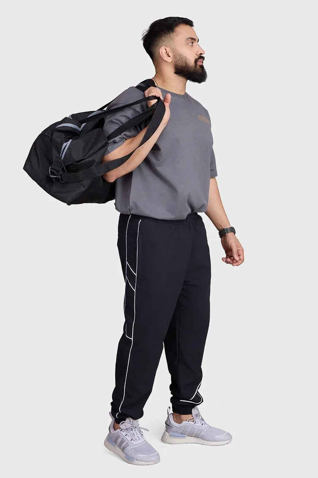 Charcoal Rage oversized T-shirt by Fuaark Nz, showing a relaxed fit and soft fabric, ideal for casual wear.