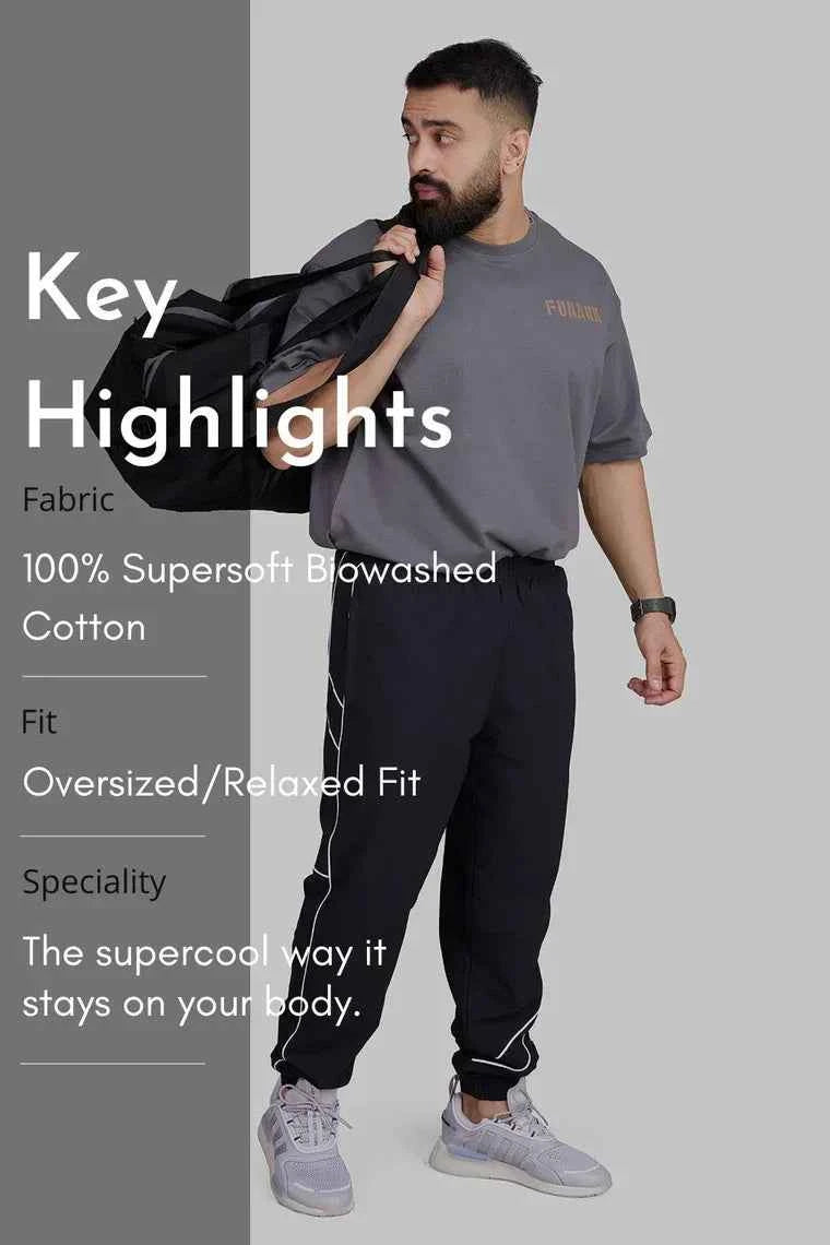 Charcoal Rage oversized T-shirt by Fuaark Nz, soft and comfortable fit, casual style, shown on a model.