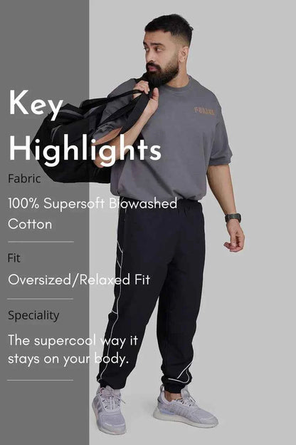Charcoal Rage oversized T-shirt by Fuaark Nz, soft and comfortable fit, casual style, shown on a model.