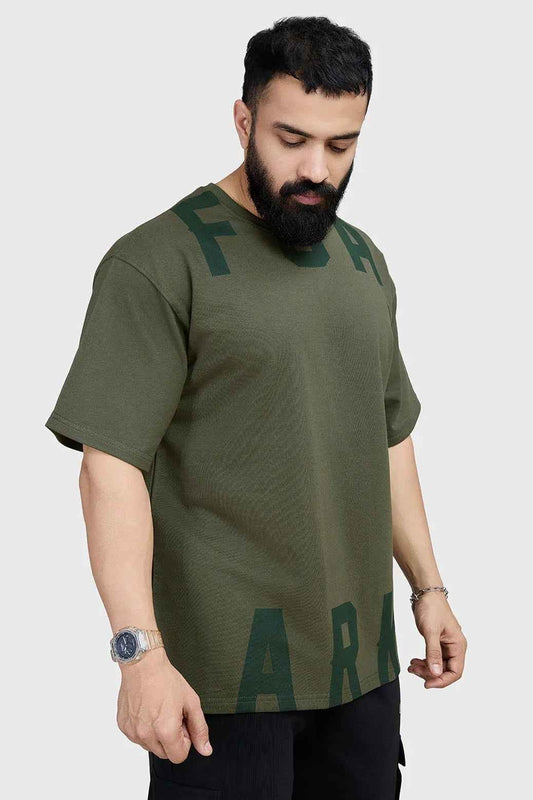 Olive green oversized T-shirt by Fuaark Nz, made from soft fabric, featuring a relaxed fit and minimal design for effortless style.