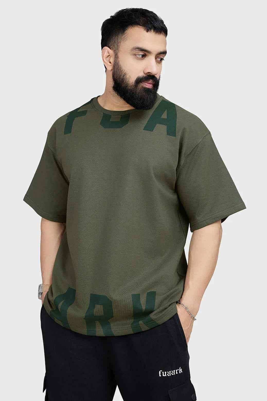 Fuaark Nz oversized olive T-shirt for women, relaxed fit, soft fabric, casual style, shown on a model.