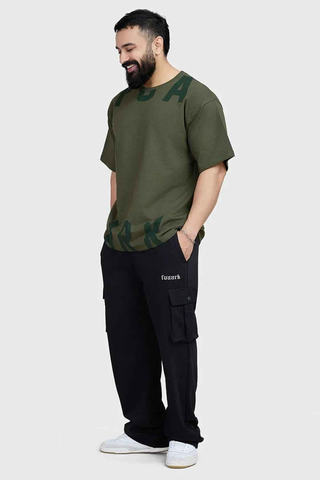 Fuaark Nz oversized olive T-shirt for women, relaxed fit, soft fabric, casual style, featuring short sleeves and a round neckline.