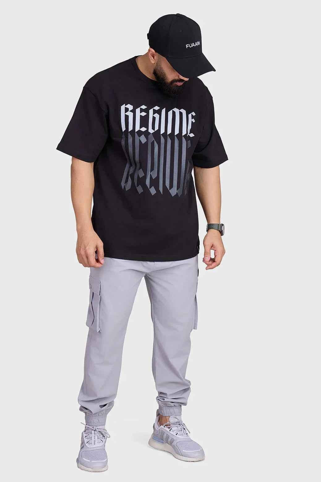 Oversized black T-shirt from Fuaark Nz with a relaxed fit, perfect for casual comfort and stylish everyday wear.