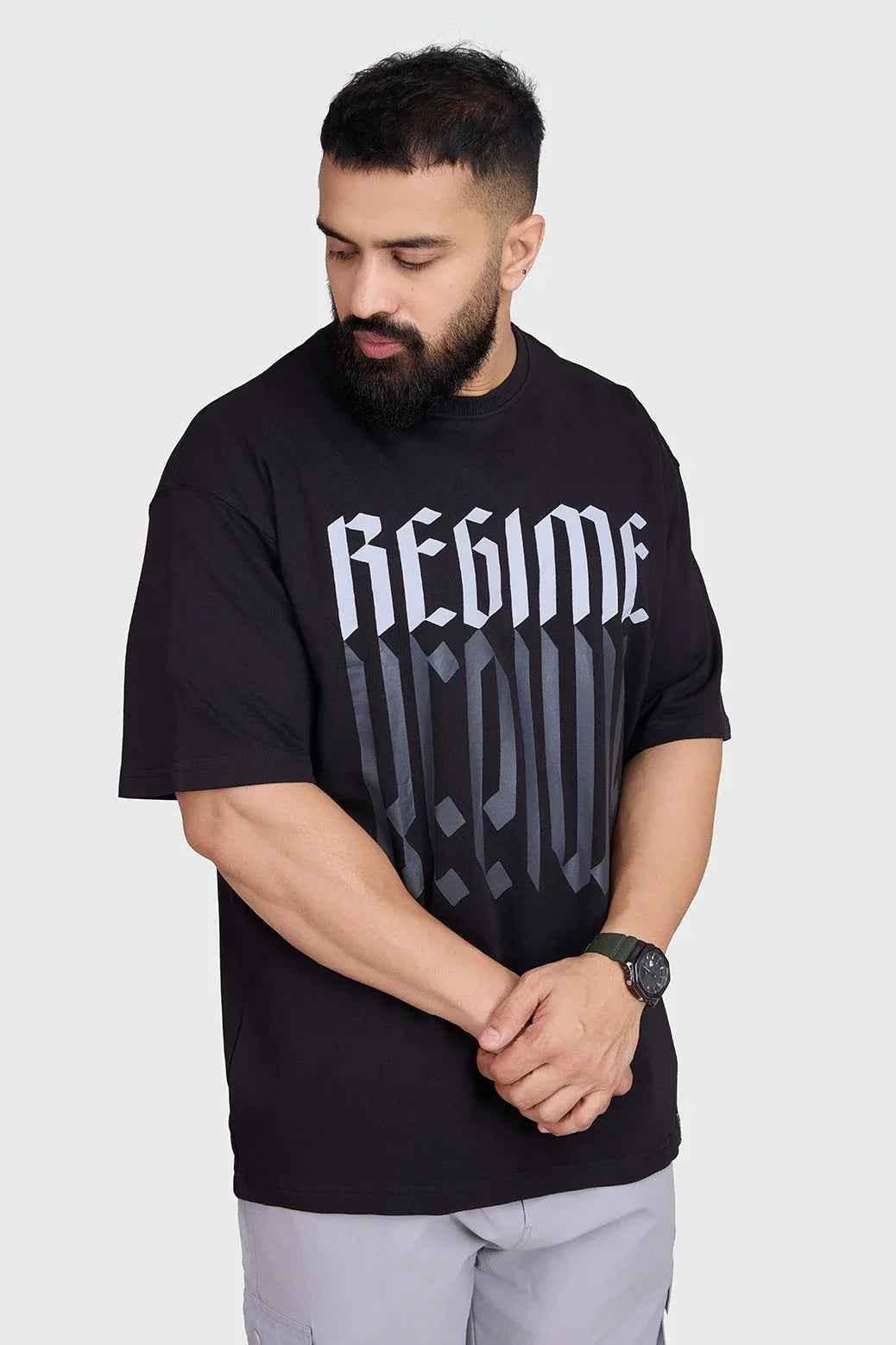 Fuaark Nz oversized black T-shirt for men, casual style, soft fabric, relaxed fit, perfect for comfort and everyday wear.