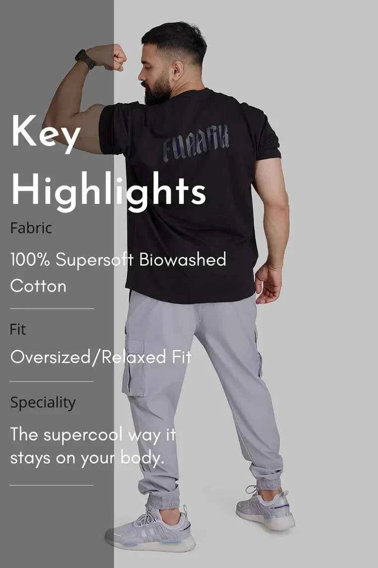 Oversized black T-shirt by Fuaark Nz with a relaxed fit, perfect for comfort and casual style.