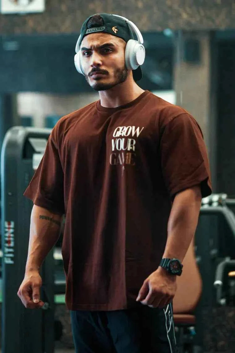 Unisex oversized coffee-colored T-shirt by Fuaark Nz, casual fit, soft fabric, designed for ultimate comfort.