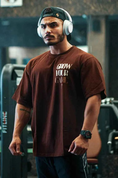 Unisex oversized coffee-colored T-shirt by Fuaark Nz, casual fit, soft fabric, designed for ultimate comfort.