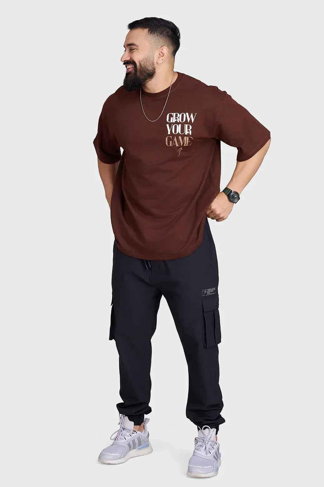 Unisex oversized coffee-colored T-shirt by Fuaark Nz, featuring a relaxed fit and soft cotton fabric for ultimate comfort.