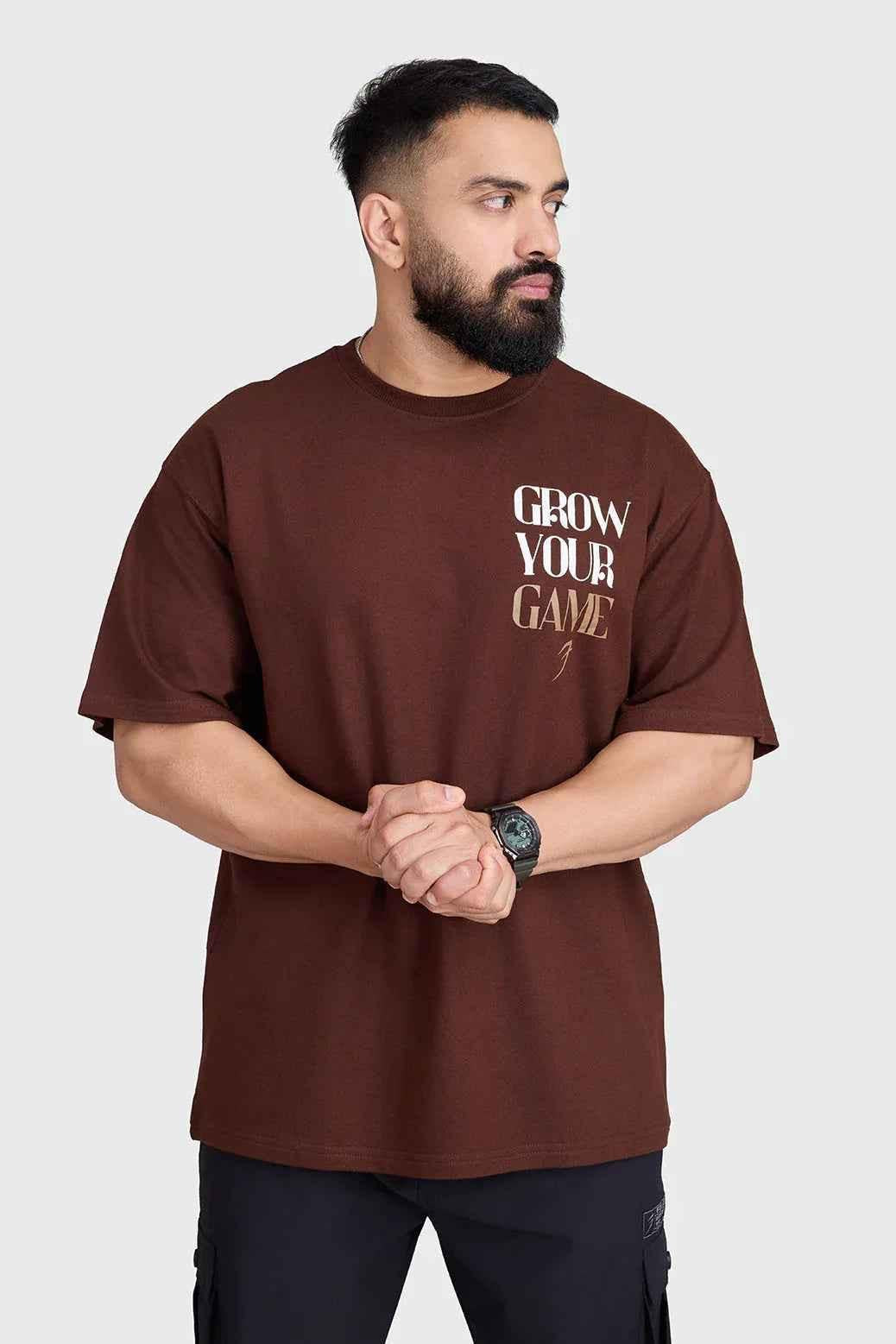 Unisex oversized coffee-colored T-shirt by Fuaark Nz, casual fit, soft fabric, perfect for comfortable everyday wear.
