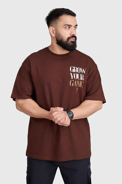 Unisex oversized coffee-colored T-shirt by Fuaark Nz, casual fit, soft fabric, perfect for comfortable everyday wear.