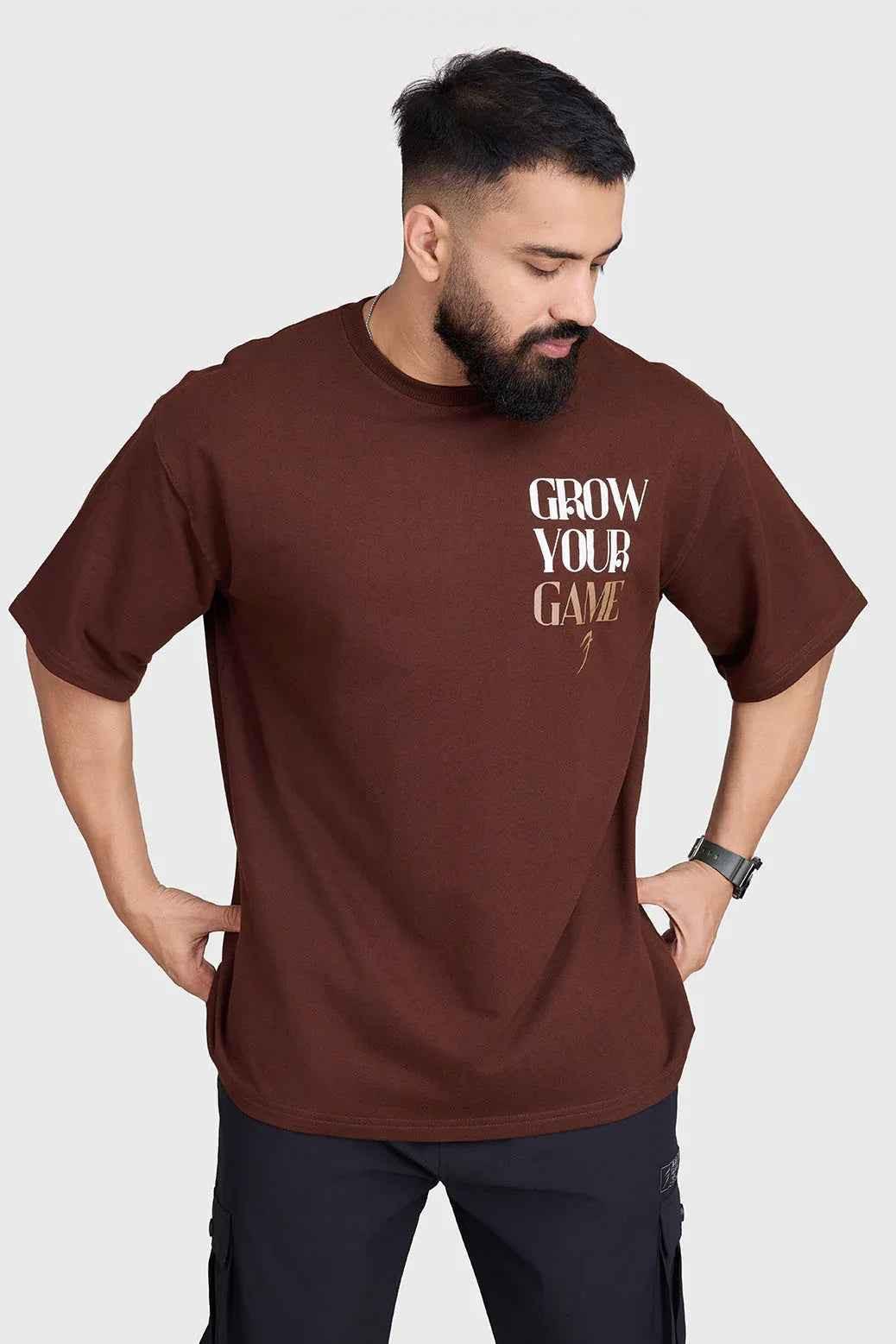 Unisex oversized coffee-colored T-shirt from Fuaark Nz featuring a relaxed fit and casual style.