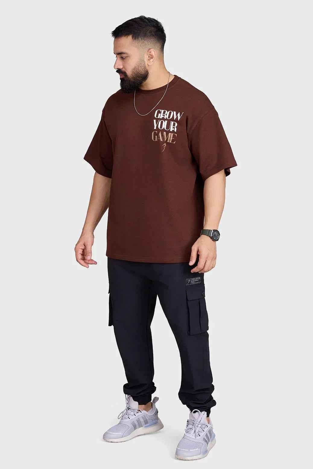 Unisex oversized coffee-colored T-shirt by Fuaark Nz, casual fit, made for comfortable everyday wear.
