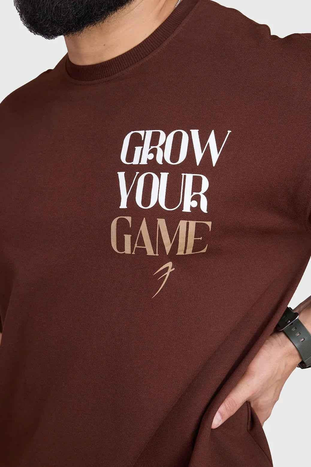 Unisex oversized coffee-colored T-shirt by Fuaark Nz, casual fit, soft fabric, perfect for comfortable everyday wear.