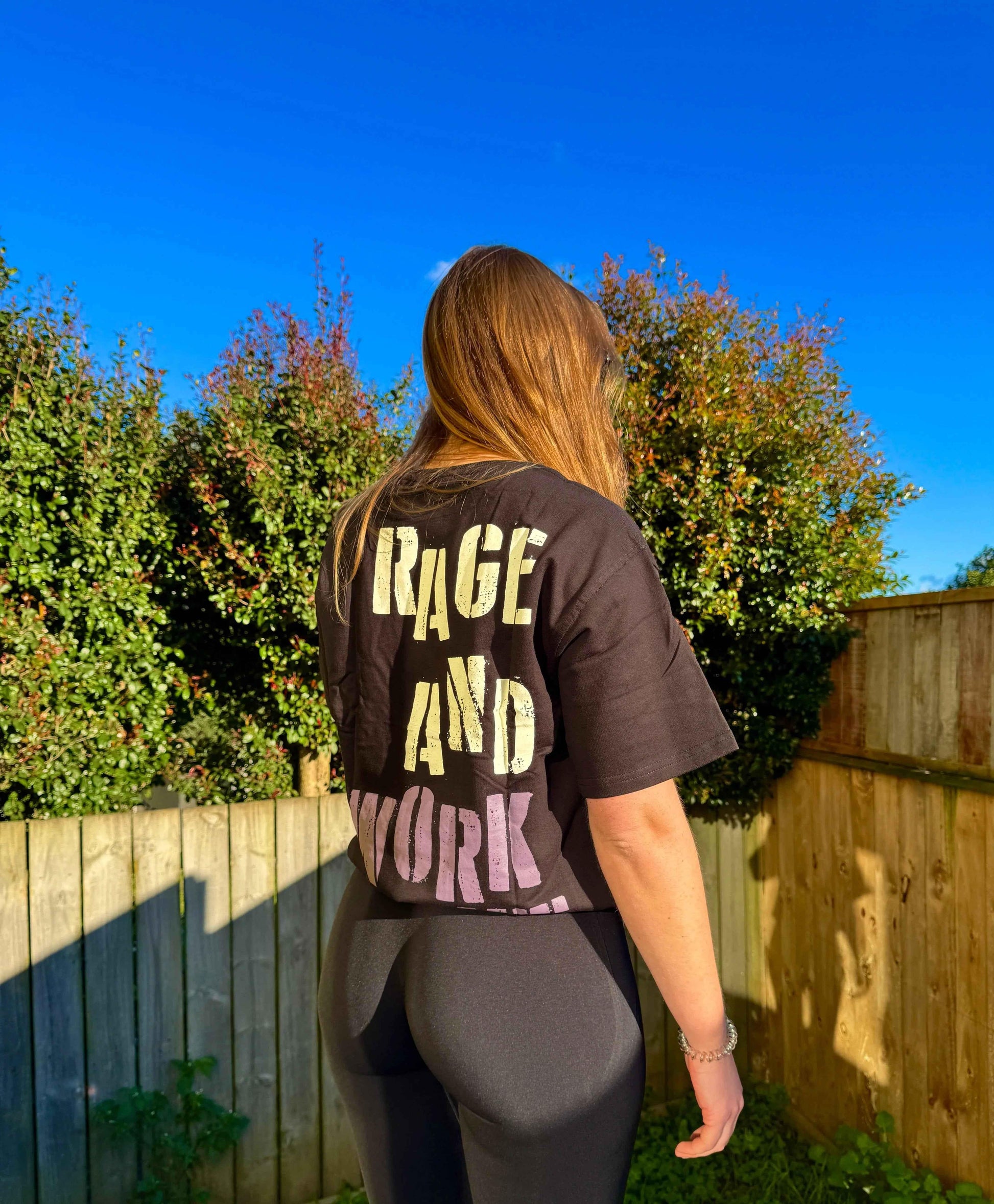 Black unisex oversized Rage T-shirt by Fuaark Nz, showcasing a relaxed fit and comfortable casual style.