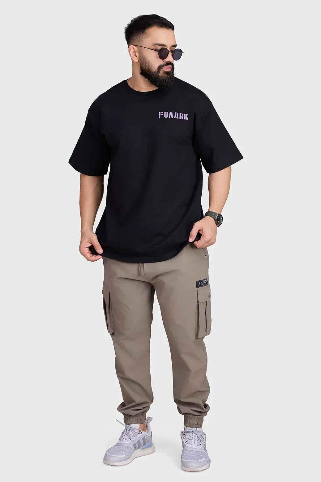 Black unisex oversized Rage T-shirt by Fuaark Nz, showcasing a relaxed fit and comfortable style.