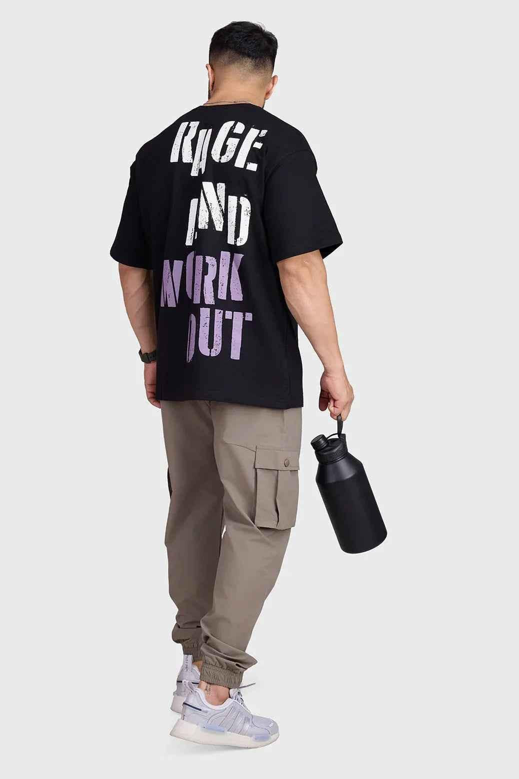 Unisex black oversized rage T-shirt by Fuaark Nz, featuring a relaxed fit and bold graphic design for casual style.