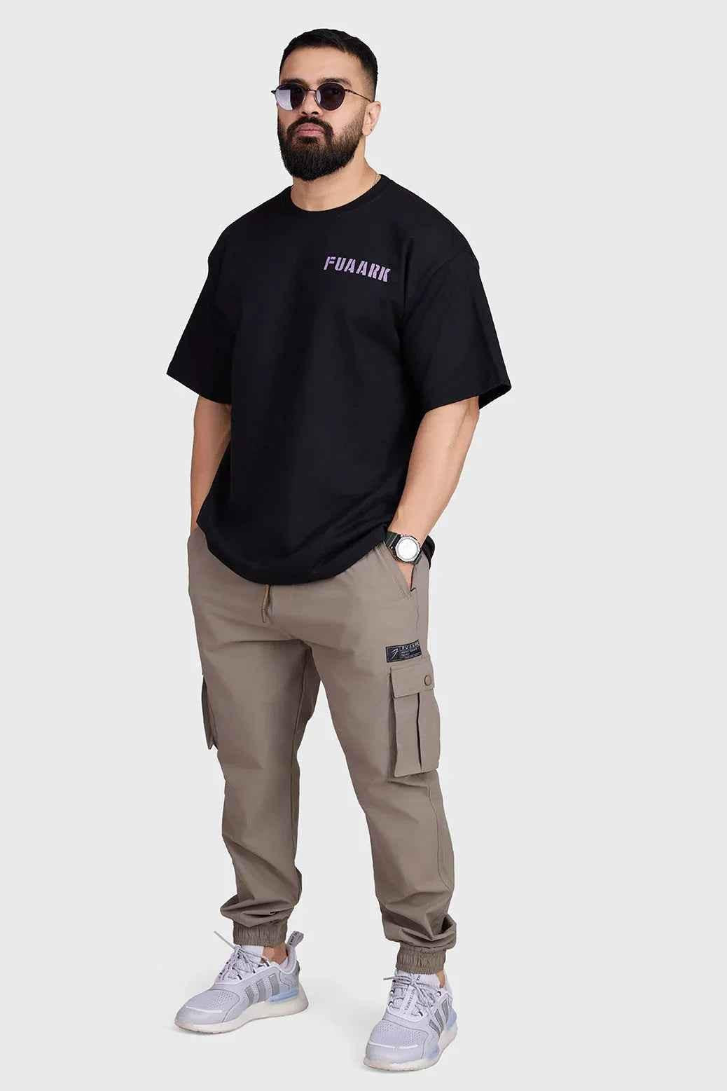 Black unisex oversized Rage T-shirt by Fuaark Nz, showing the relaxed fit and comfortable fabric design.