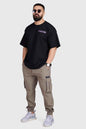 Black unisex oversized Rage T-shirt by Fuaark Nz, showing the relaxed fit and comfortable fabric design.