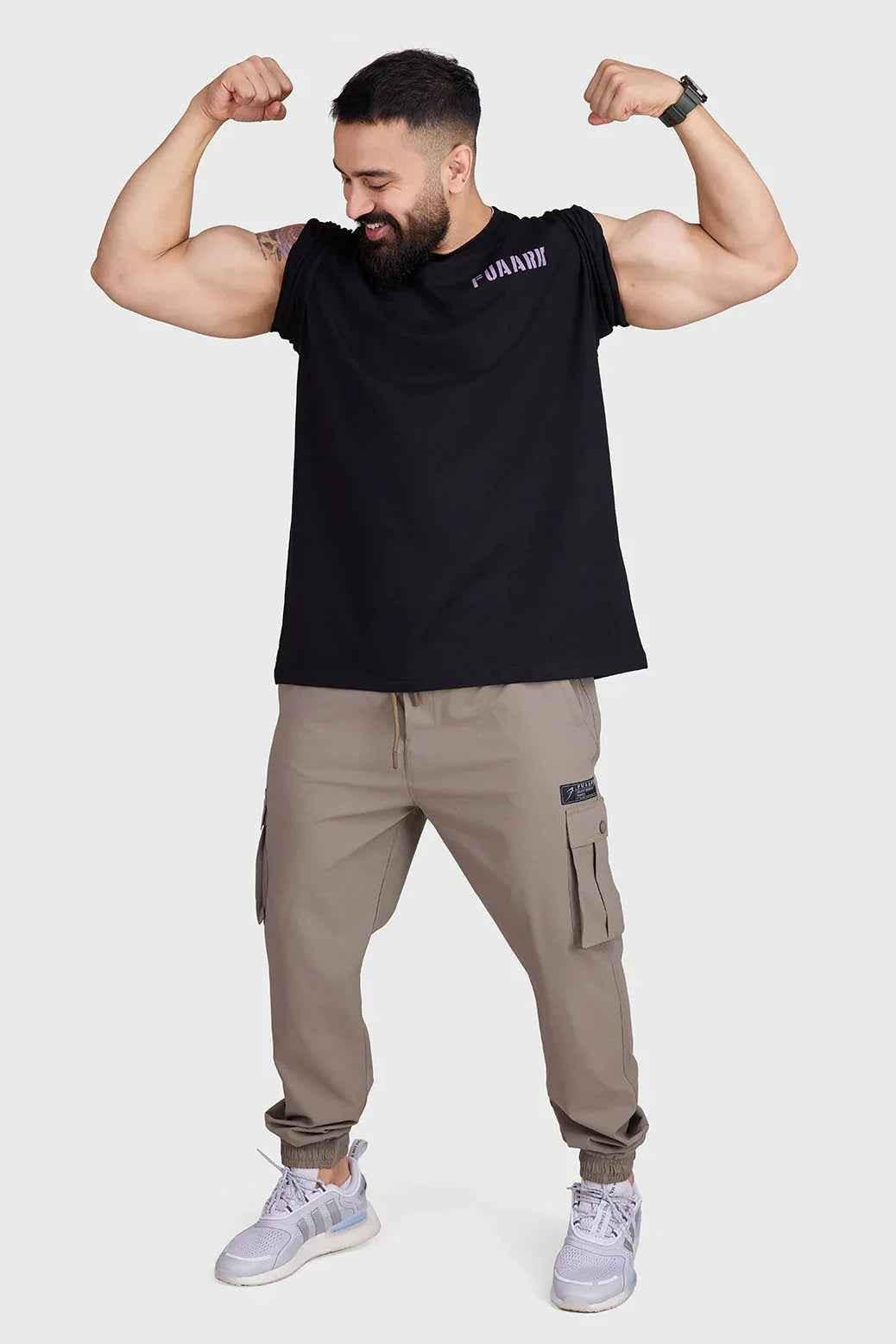 Unisex oversized black Rage T-shirt by Fuaark Nz, showing the relaxed fit and soft fabric for casual style and comfort.