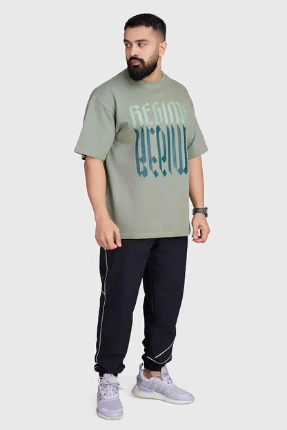 Unisex oversized sage green T-shirt by Fuaark Nz with a relaxed fit and casual style.