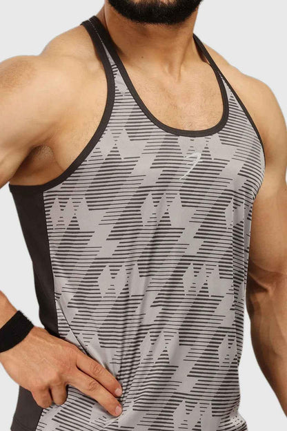 Light grey Amplify Stringer tank top by Fuaark NZ, close-up of fitted sleeveless athletic top with branding details.
