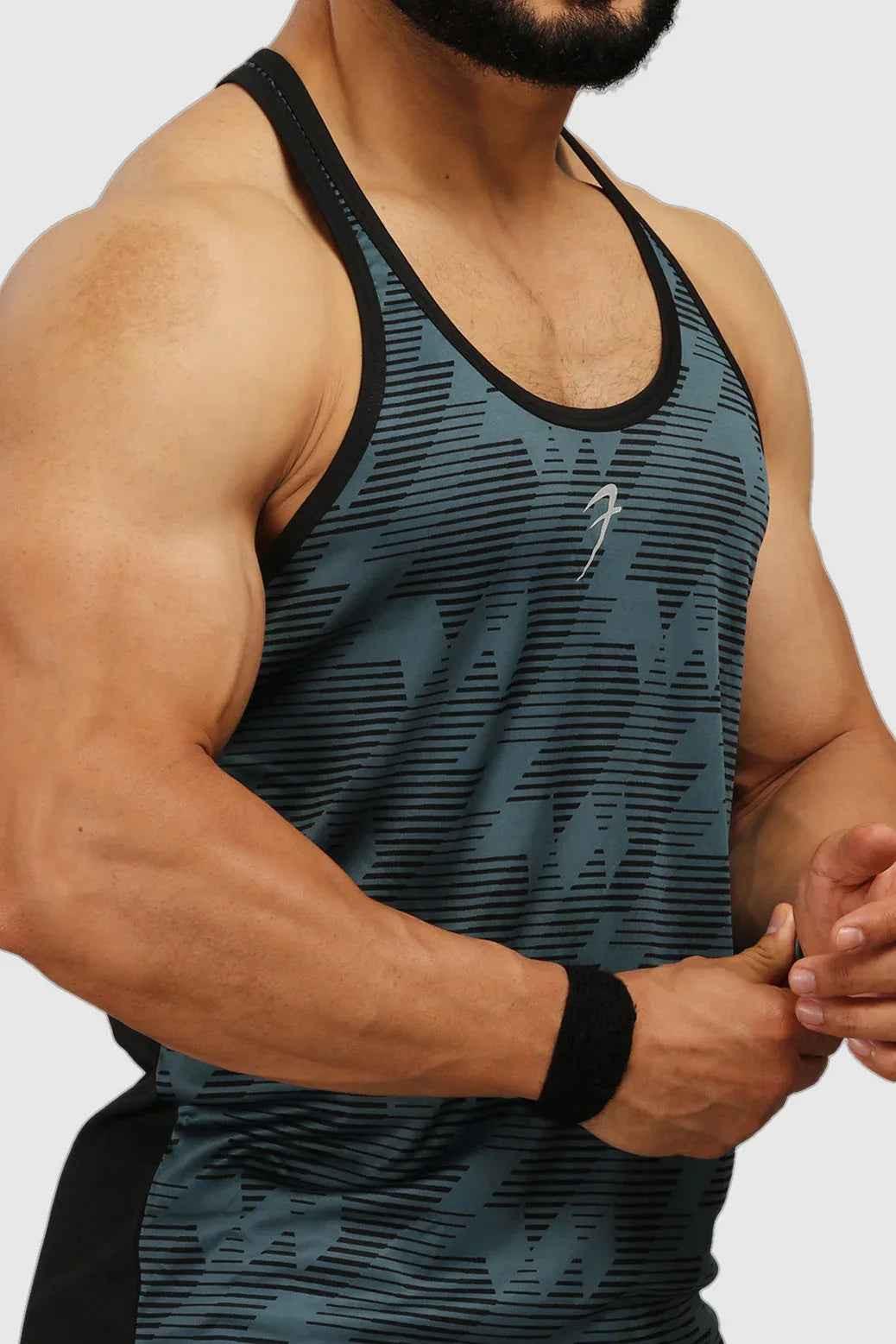 Blue Amplify Stringer Tank by Fuaark Nz, high-performance men's workout tank top with athletic fit and breathable fabric.