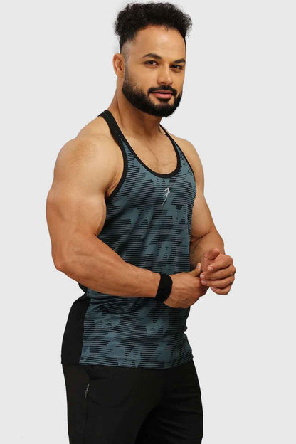 Blue Amplify Stringer Tank Top by Fuaark Nz, high-performance workout gear for men, shown on a model.