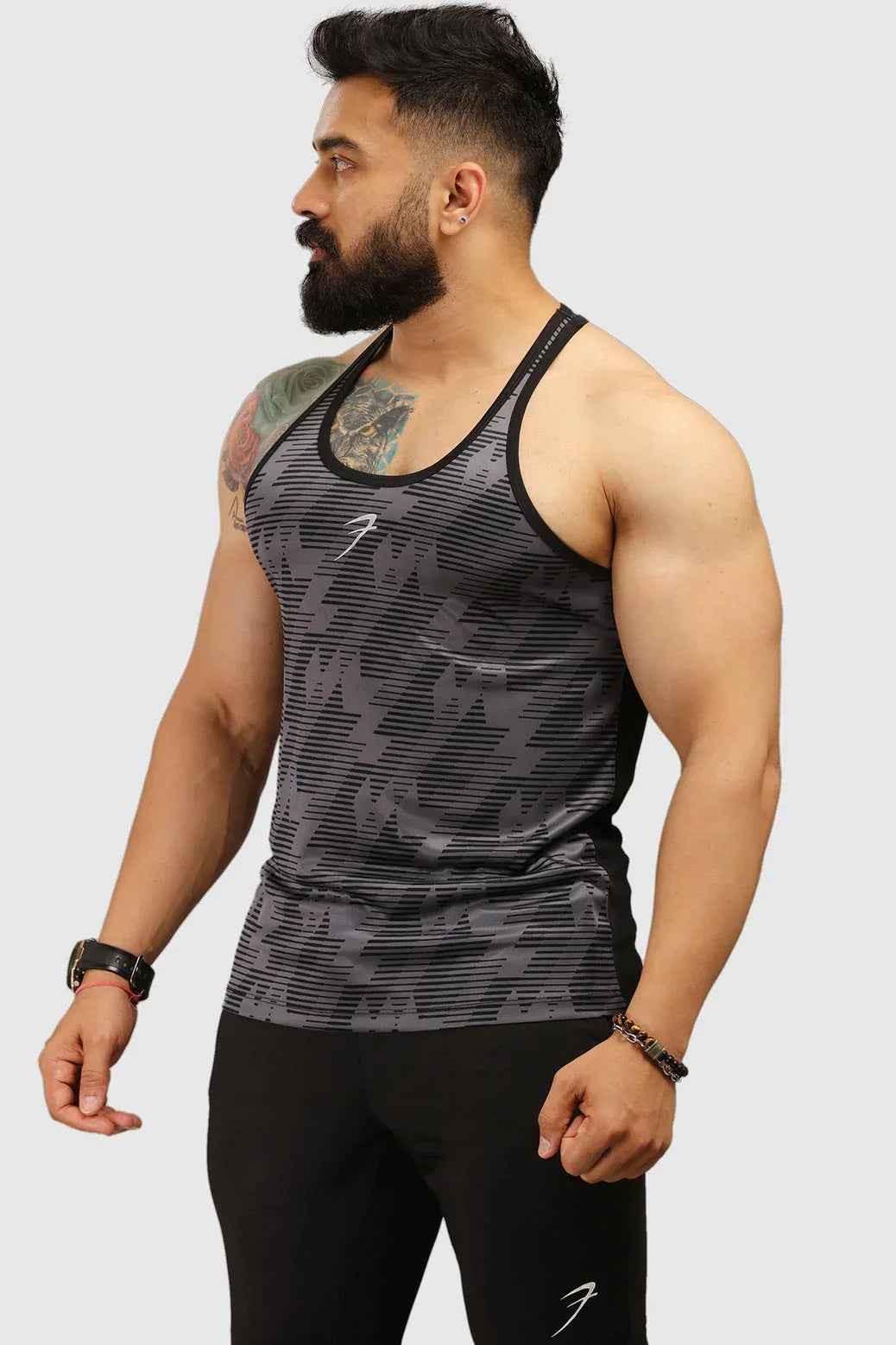 Grey Amplify Stringer Tank Top by Fuaark NZ, designed for ultimate fitness performance, displayed on a mannequin.